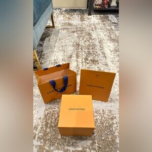 Authentic Louis Vuitton empty boxes and shopping bags